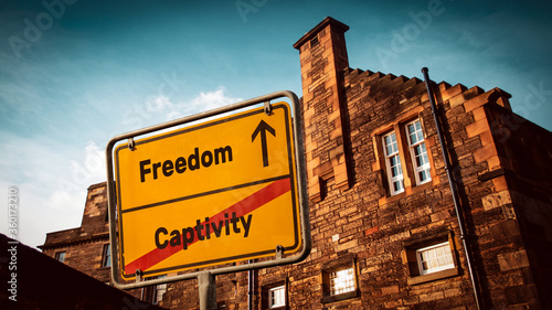 Street Sign to Freedom versus Captivity