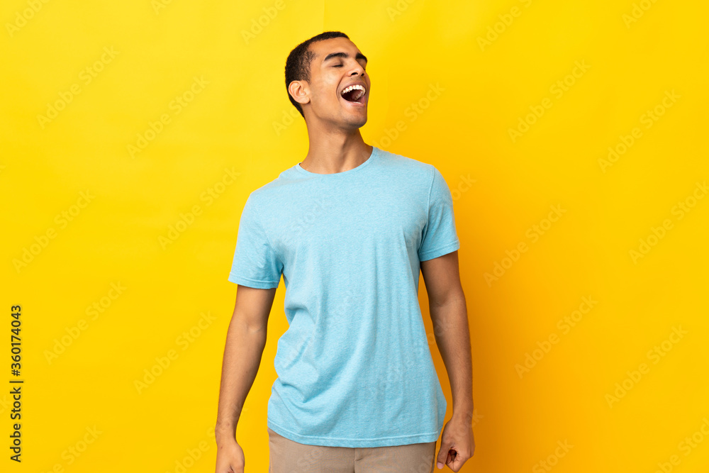 African American man over isolated background laughing African American man over isolated background laughing