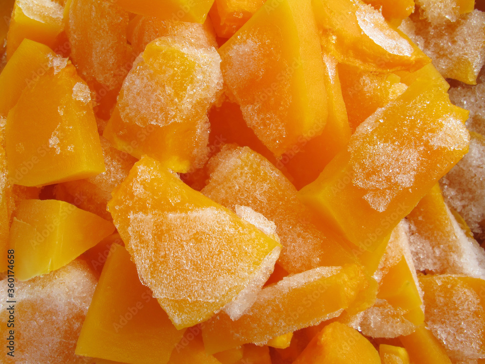 Slices of frozen pumpkin as background Slices of frozen pumpkin as background