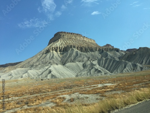 Amazing mulit-colored Butte with various rock features in Colorado Plateau.