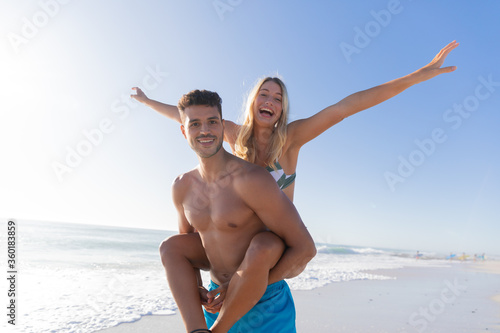 Caucasian couple enjoying time at the beach #360183859