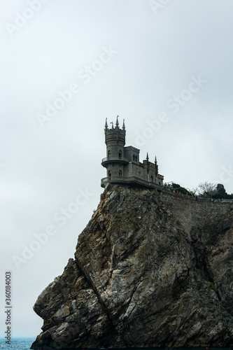 Historical architectural monument of the southern coast of Crimea swallow s Nest castle. It is located on a steep cliff that goes into the sea.