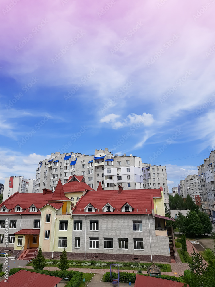 City buildings and blue sky.