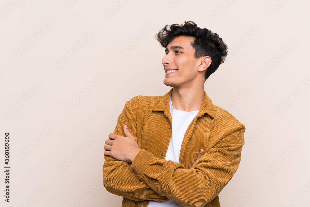 Young Argentinian man over isolated background happy and smiling Young Argentinian man over isolated background happy and smiling