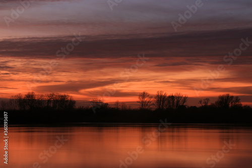 Colorful sunset by the Odra River  Poland.