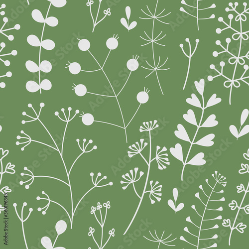Seamless pattern with branches of plants . Botanical design in shades of green. Vector illustration.