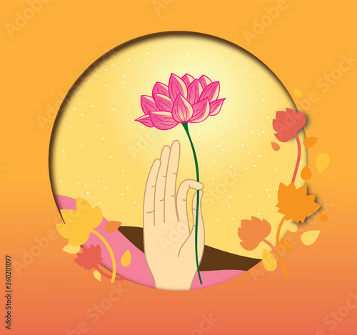 Hand holding lotus flower