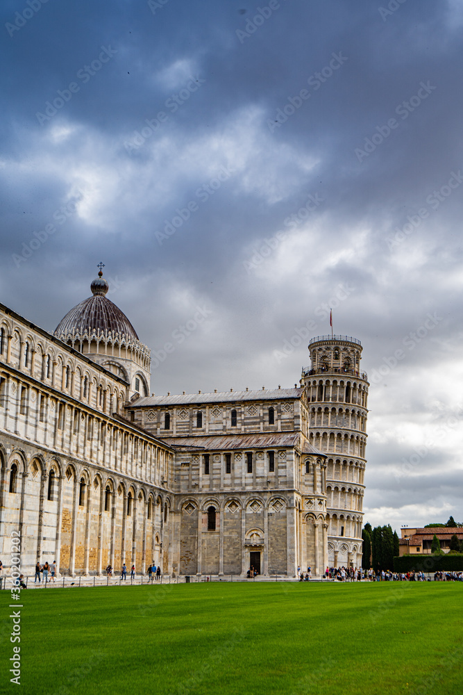 Duomo Leaning tower of Pisa with dramatic sky 