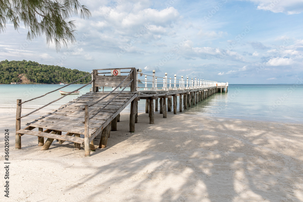 old wooden pier,Saracen bay beach, Koh Rong Samloem island, Sihanoukville, Cambodia.
