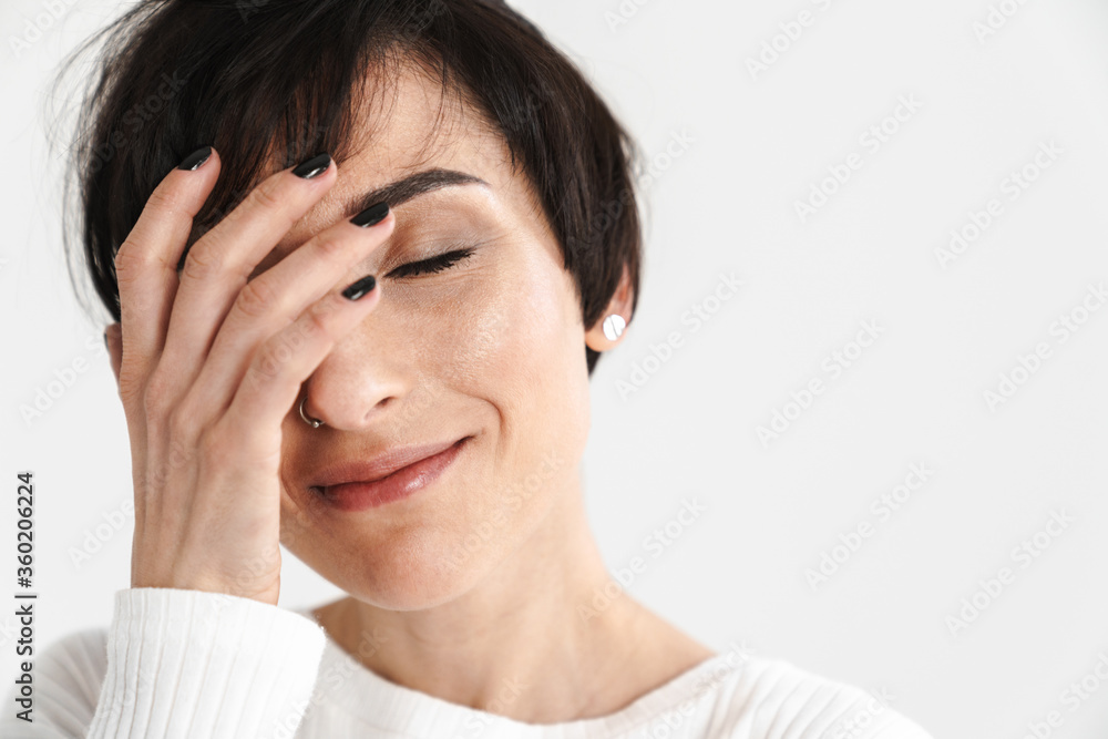 Portrait of an attractive short brunette haired woman Portrait of an attractive short brunette haired woman
