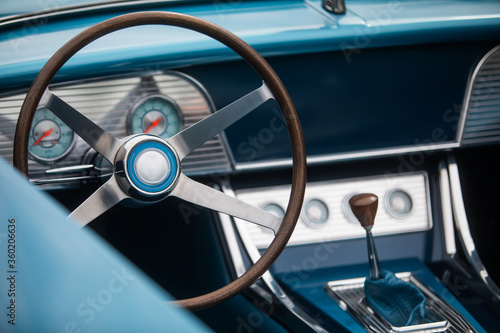 Wooden steering wheel of an old classic car © bizoo_n