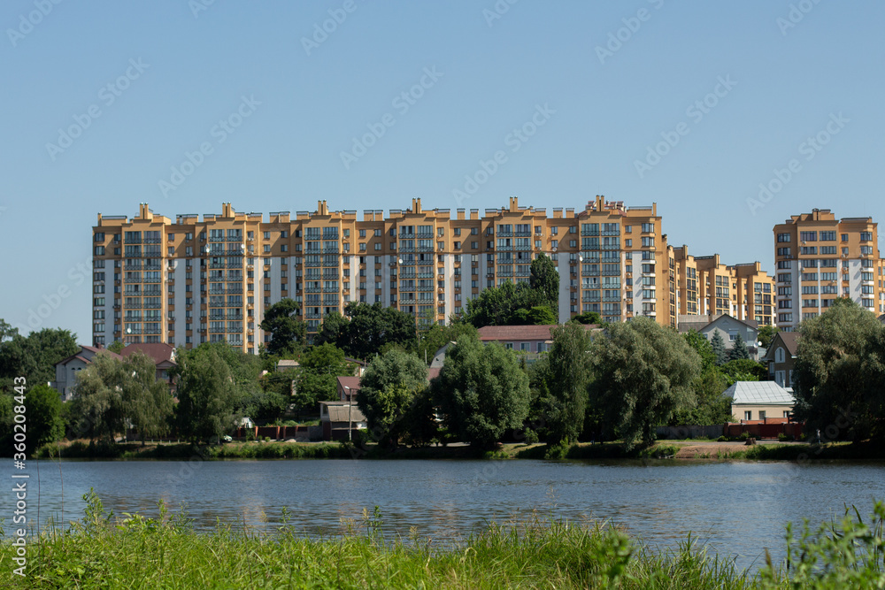 apartment building on a background of blue sky