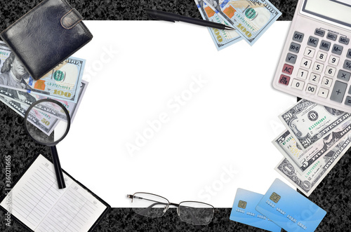 Office flat lay composition with calculator, address book and other office items on brown wooden table background with top view. Accountant paperwork photo