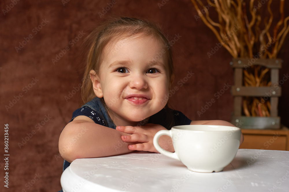 Cheerful child headshot, little girl with a charming smile. Cheerful child headshot, little girl with a charming smile.