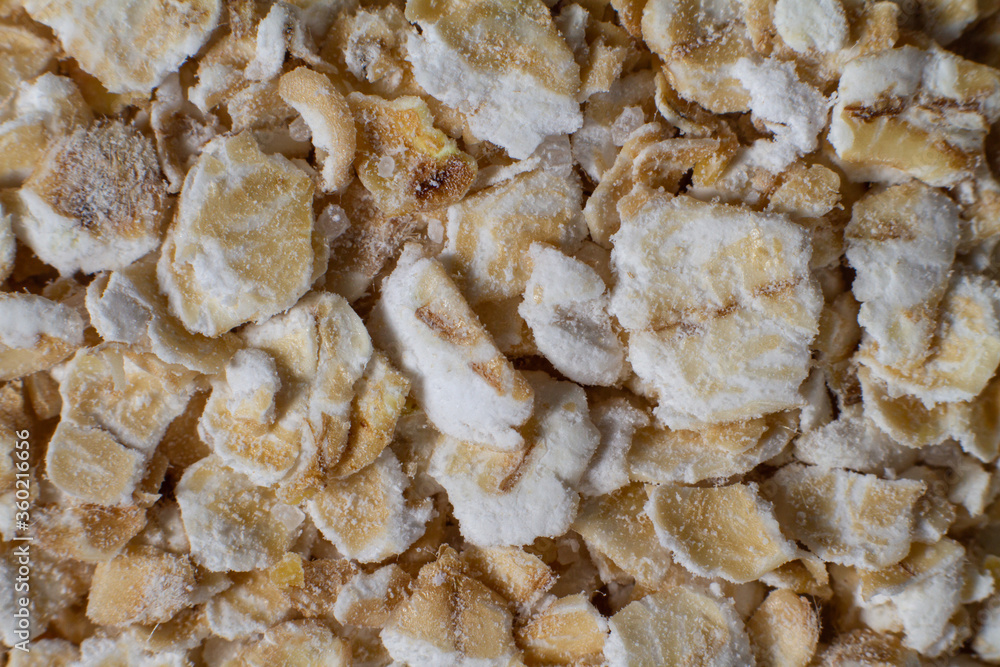 Macro photo of oatmeal. Whole grains of oats, porridge for breakfast. Gluten. Macro photo of oatmeal. Whole grains of oats, porridge for breakfast. Gluten.