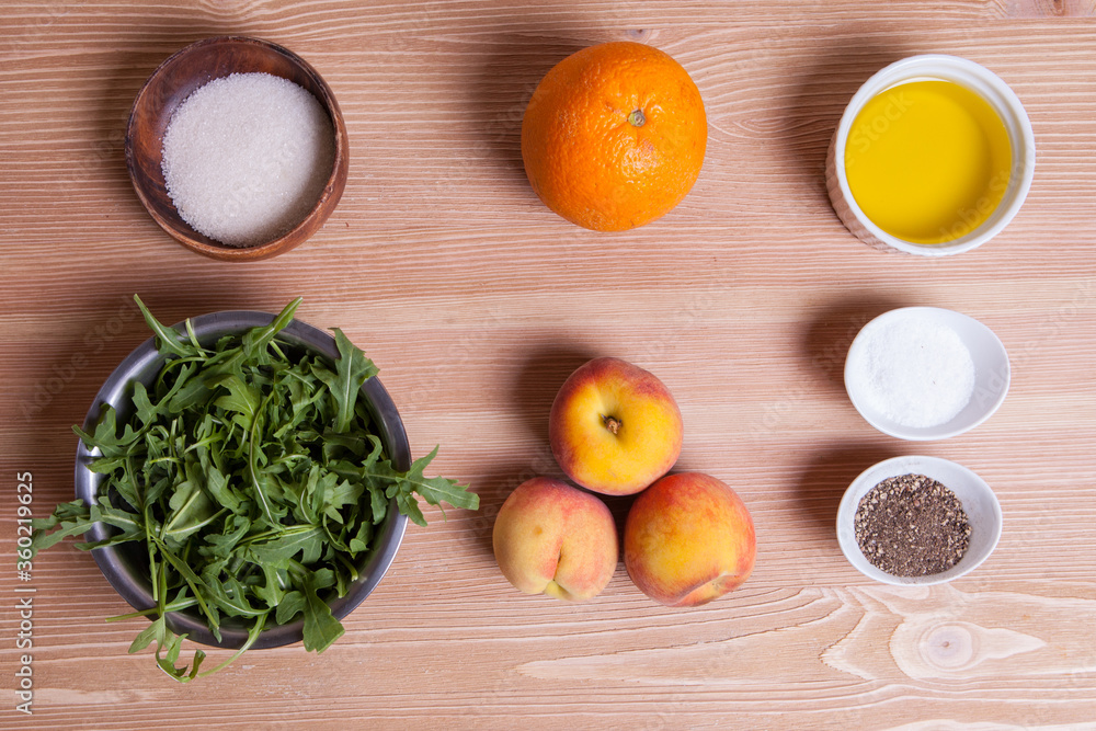 Ingredients for a peach salad with arugula Ingredients for a peach salad with arugula