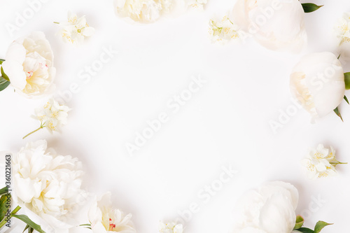 Romantic banner  delicate white peonies flowers close-up. Fragrant pink petals