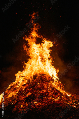 Top of a giant bonfire burning in the night