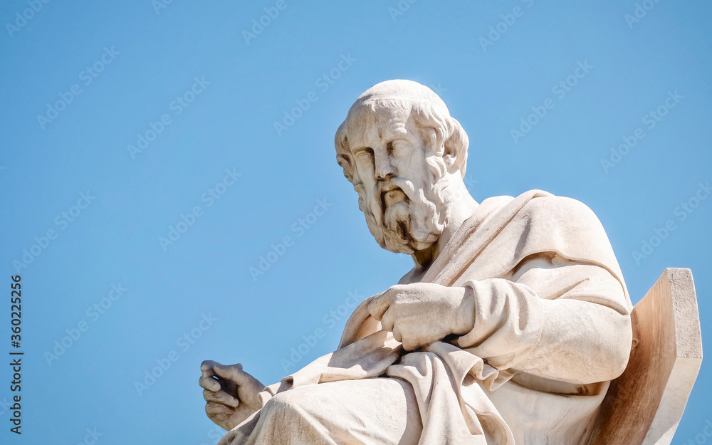Plato the ancient Greek philosopher white marble statue on sky background, Athens Greece