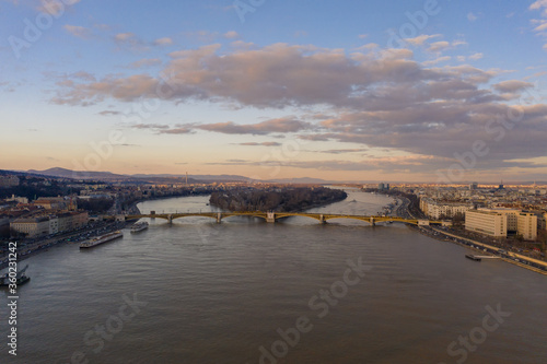 Aerial drone shot of Margaret Bridge over Danube river in Budapest sunset hour
