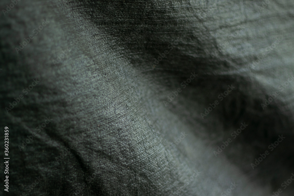 Fototapeta premium Cloth black and slightly jagged abstract background