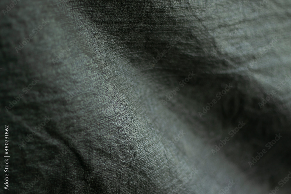 Fototapeta premium Cloth black and slightly jagged abstract background