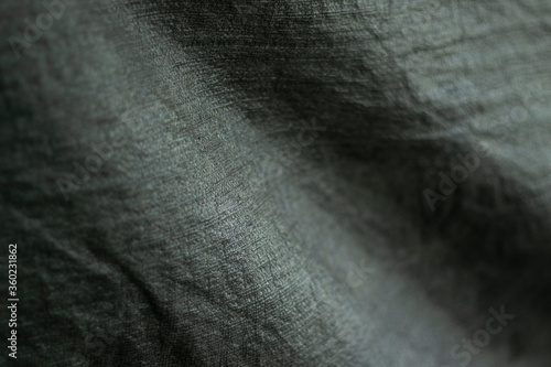 Cloth black and slightly jagged abstract background