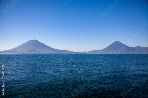 Lake Atitlan is a beautiful lake in the mountains of Guatemala and is surrounded by active volcanos.
