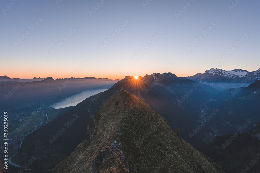 Obraz premium Scenic moutain ridge during sunrise in the Swiss alps, Switzerland, Interlaken