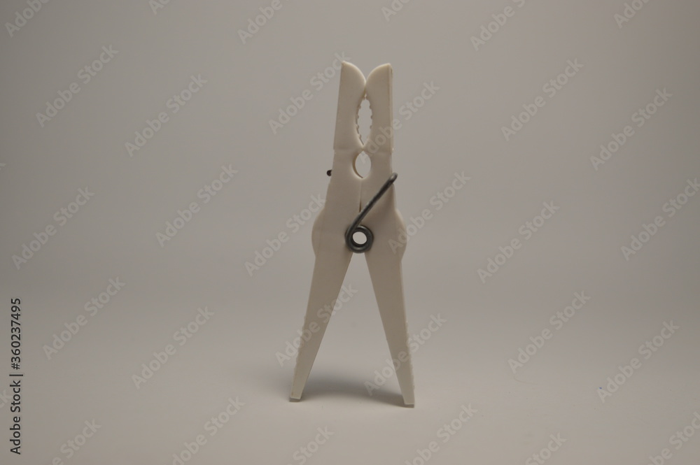 White clothespin on a white background White clothespin on a white background