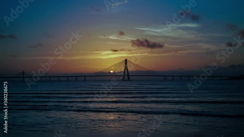 4K Time lapse footage of Sunset at Bandra Worli sea link also known as Rajiv Gandhi Sea link From Window Glass Reflaction Mumbai, India. photo