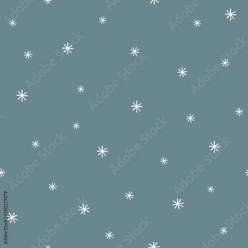 seamless pattern with white snowflakes on a blue background. Christmas illustration for print and use in design.