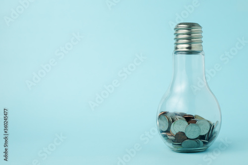 Coins in light bulb bottle ...