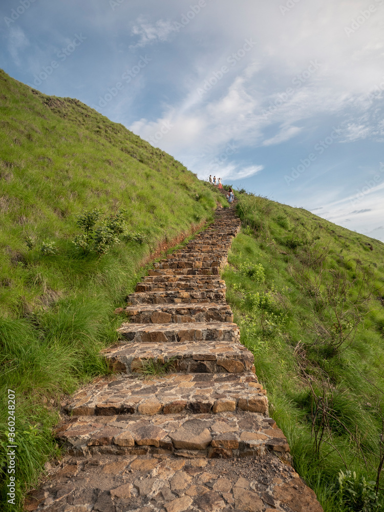 Way up to the entrance of Padar island, Komodo islands, Flores, Indonesia. Way up to the entrance of Padar island, Komodo islands, Flores, Indonesia.