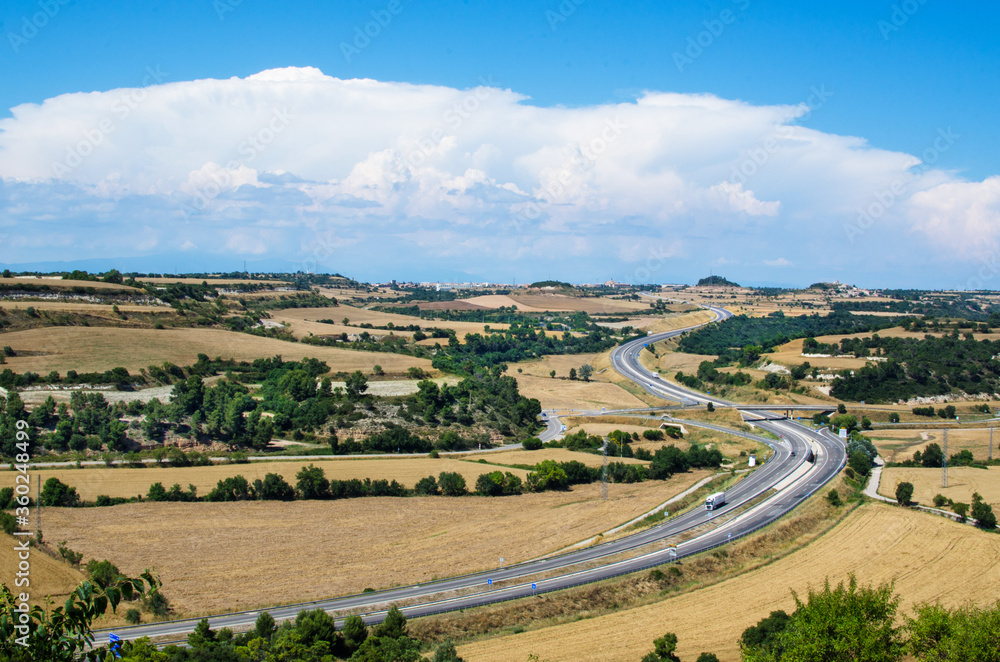 horizontal landscape with curved road