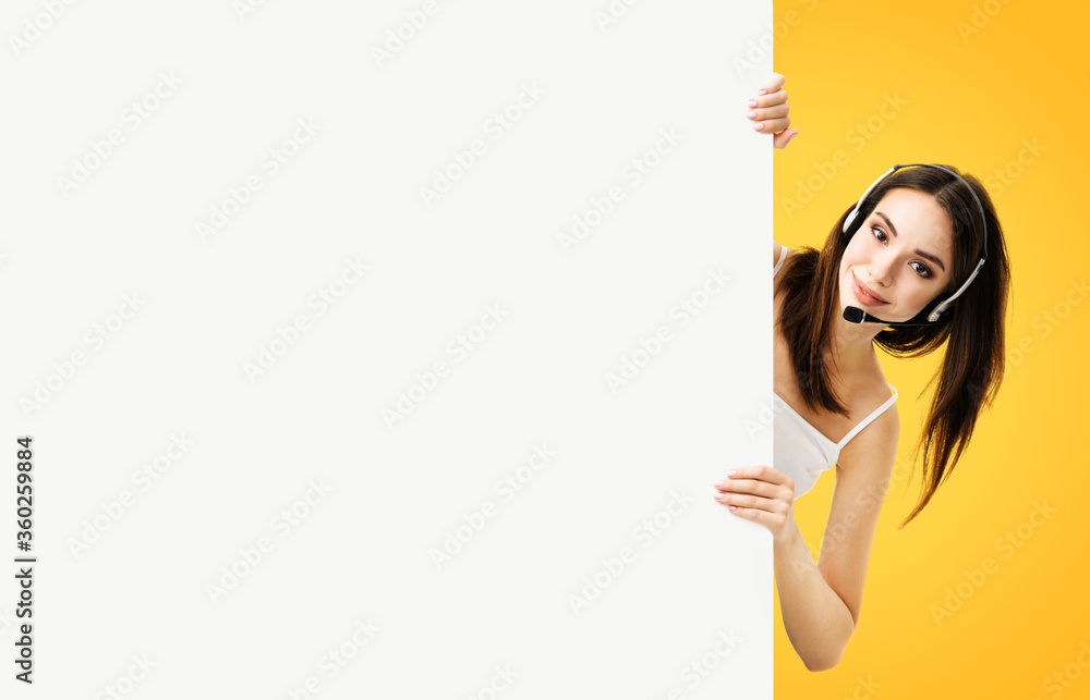 Call Center Service. Customer support or sales agent. Caller or receptionist phone operator showing empty banner with copy space. Helping, answering, consulting. Orange yellow color background. Call Center Service. Customer support or sales agent. Caller or receptionist phone operator showing empty banner with copy space. Helping, answering, consulting. Orange yellow color background.