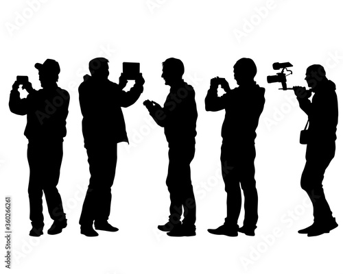 Man filming a television report on a camcorder. Isolated silhouettes on a white background