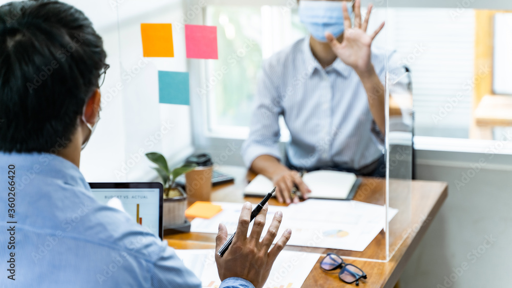 Fototapeta premium Coronavirus concept , Office workers wearing mask working together with infection protect.