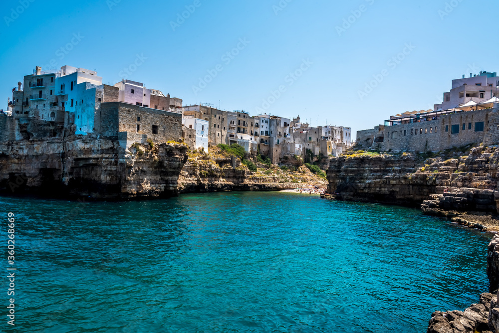 The view inland of the coastal inlet and beach at Polignano a Mare, Puglia, Italy