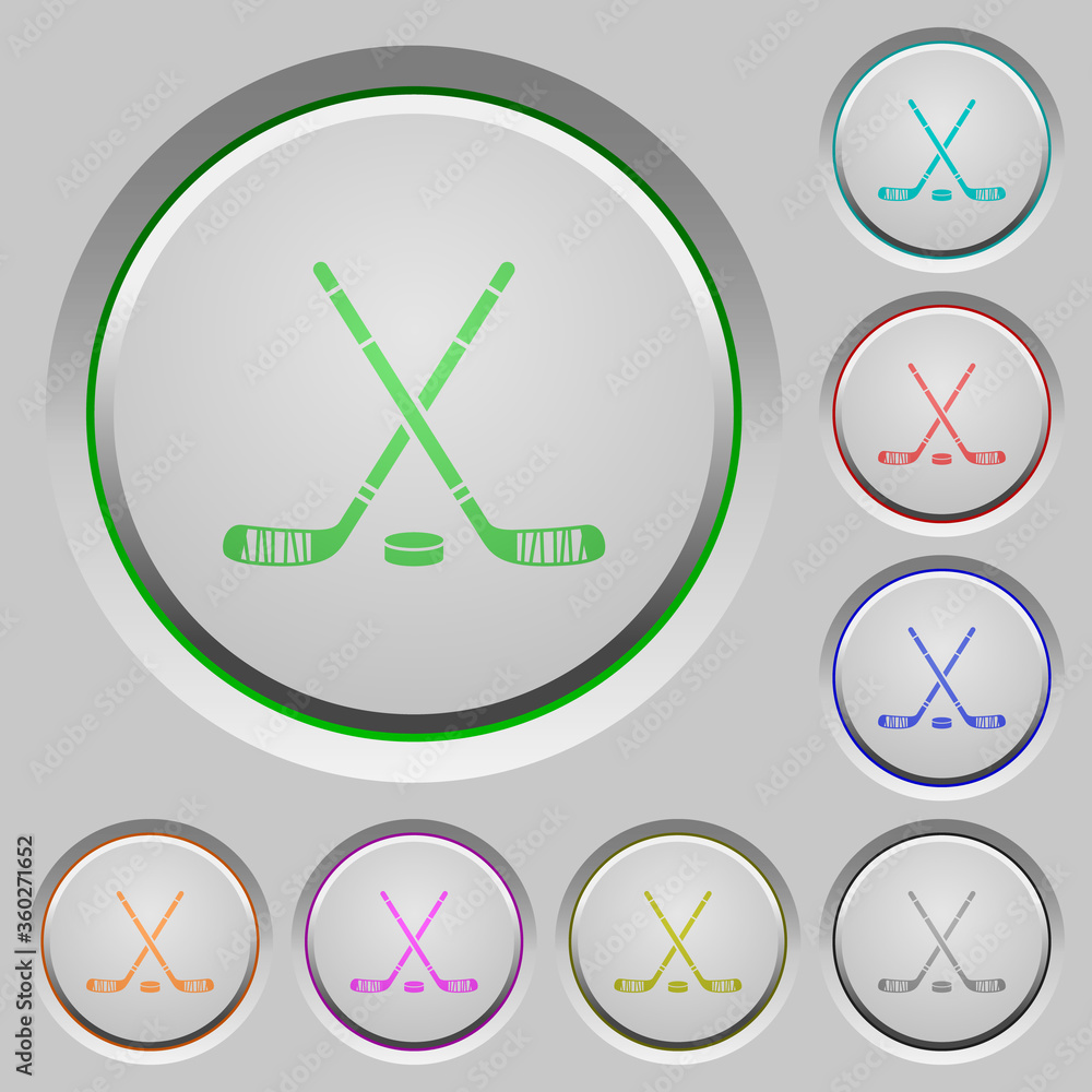 Hockey sticks with puck push buttons Hockey sticks with puck push buttons