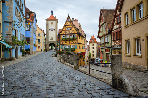 ROTHENBURG OB DER TAUBER, GERMANY - OCTOBER 18, 2016: The Plonlein (Little Square) with the Siebers Tower on the left and Kobolzell Gate on the right, one of the most photographed spots in the world.
