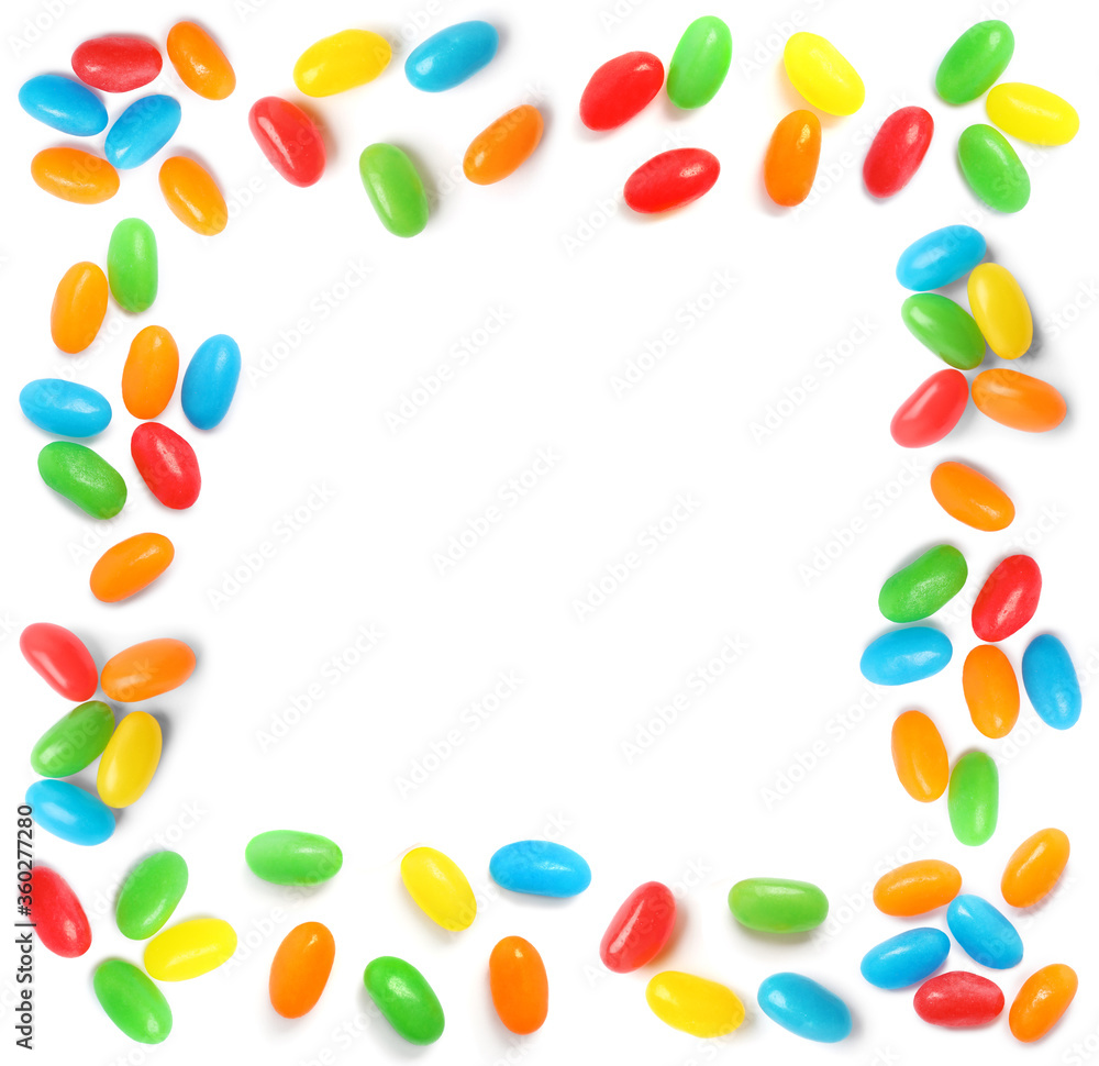Frame made of delicious color jelly beans on white background Frame made of delicious color jelly beans on white background