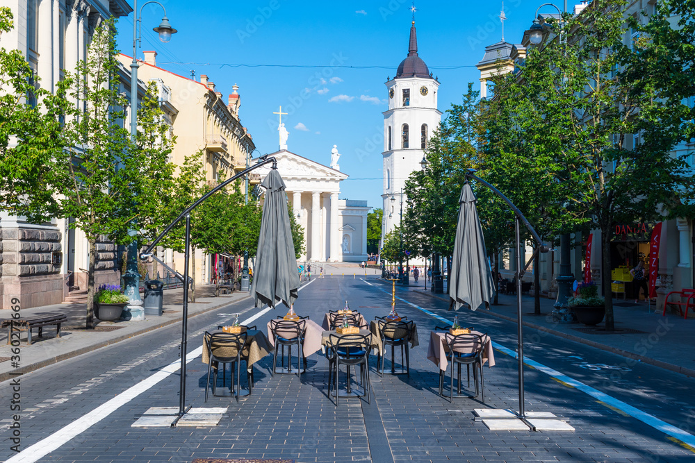 Outdoor bar and restaurant, Vilnius, Lithuania, Europe, open-air cafe city, reopening after lockdown, empty outdoor tables and chairs in the center of the main street