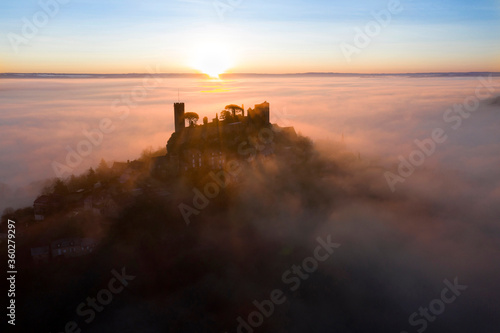 An aerial view of the hilltop village of Turenne at sunrise, Correze, Limousin, Nouvelle-Aquitaine, France