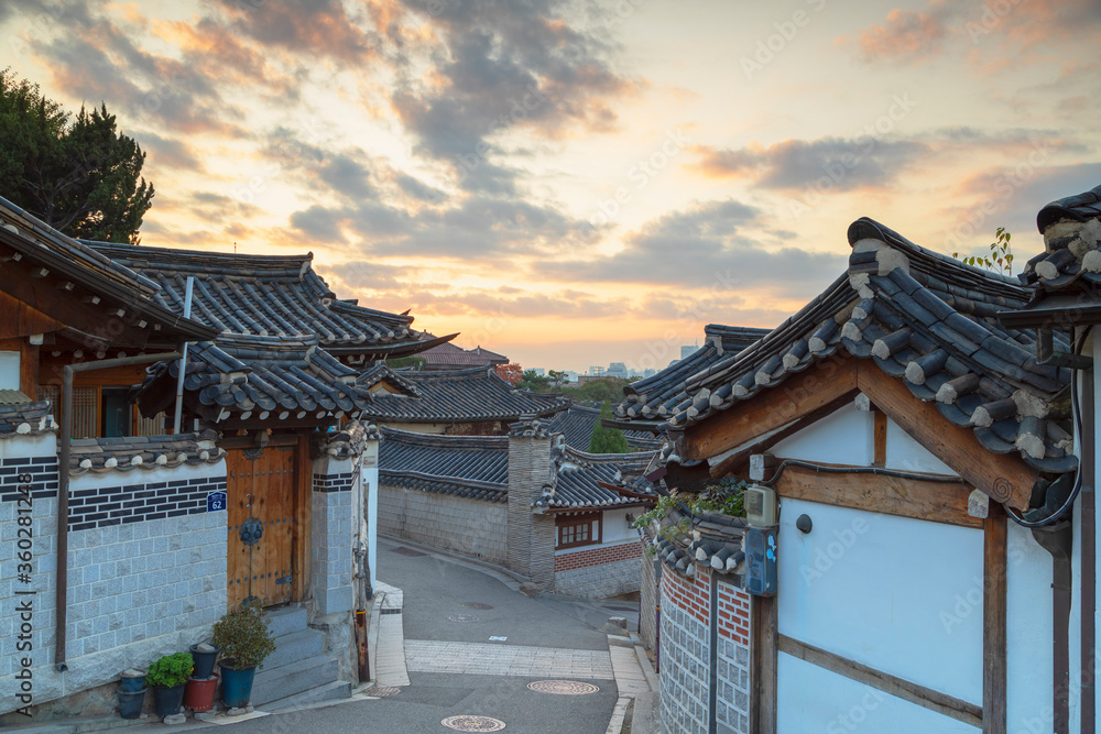 Traditional houses in Bukchon Hanok village at dawn, Seoul, South Korea Traditional houses in Bukchon Hanok village at dawn, Seoul, South Korea