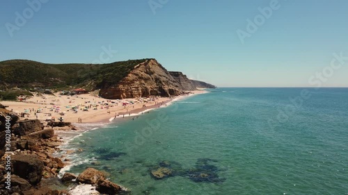 Amazing Sandy beach with Crystal clear water  with blue sky in background in a summer day.