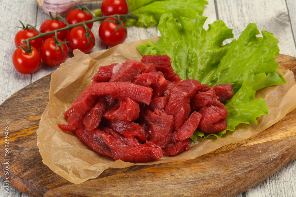 Raw beef meat sliced for cooking Raw beef meat sliced for cooking