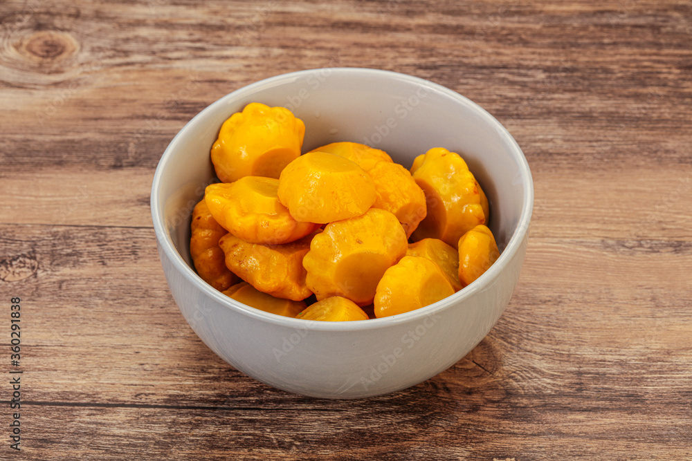 Marinated yellow patisson in the bowl Marinated yellow patisson in the bowl