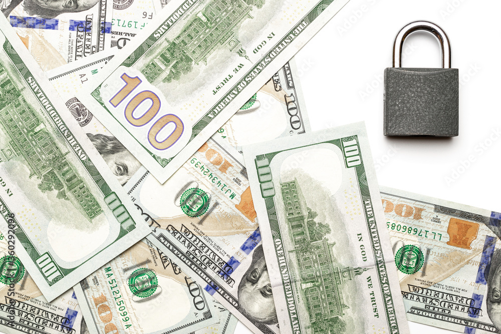Save money. Dollar sign with padlock isolated on white. American money or us bill cash on white background. Save money. Dollar sign with padlock isolated on white. American money or us bill cash on white background.