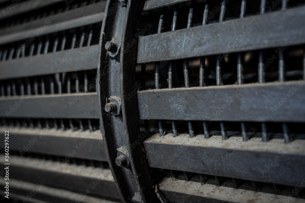 close up of an old machine on a farm